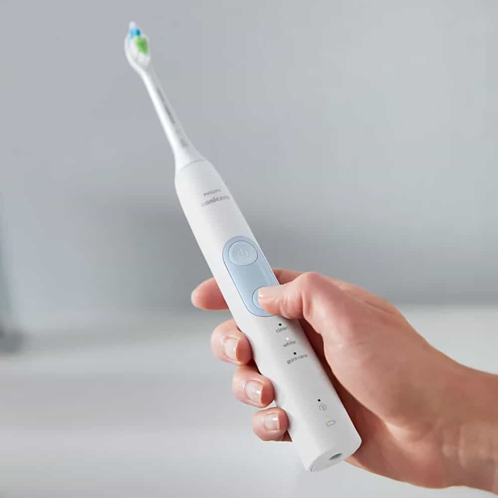 White and light blue Sonicare toothbrush