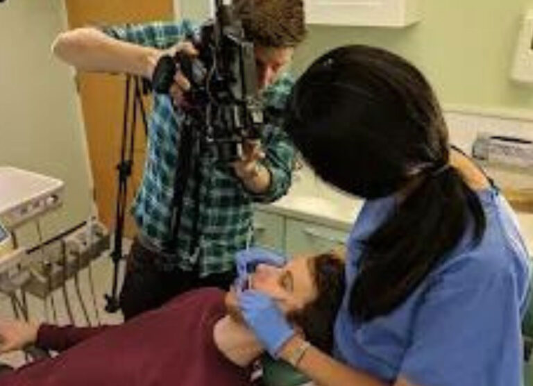 Chris, Luke and Chhaya filming an example dental examination