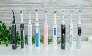 Oral-B electric toothbrushes stood next to each other