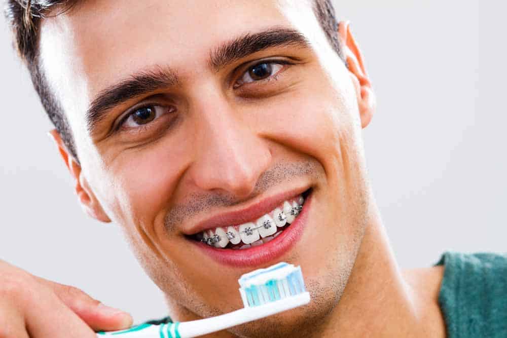 How to brush your teeth with braces 1