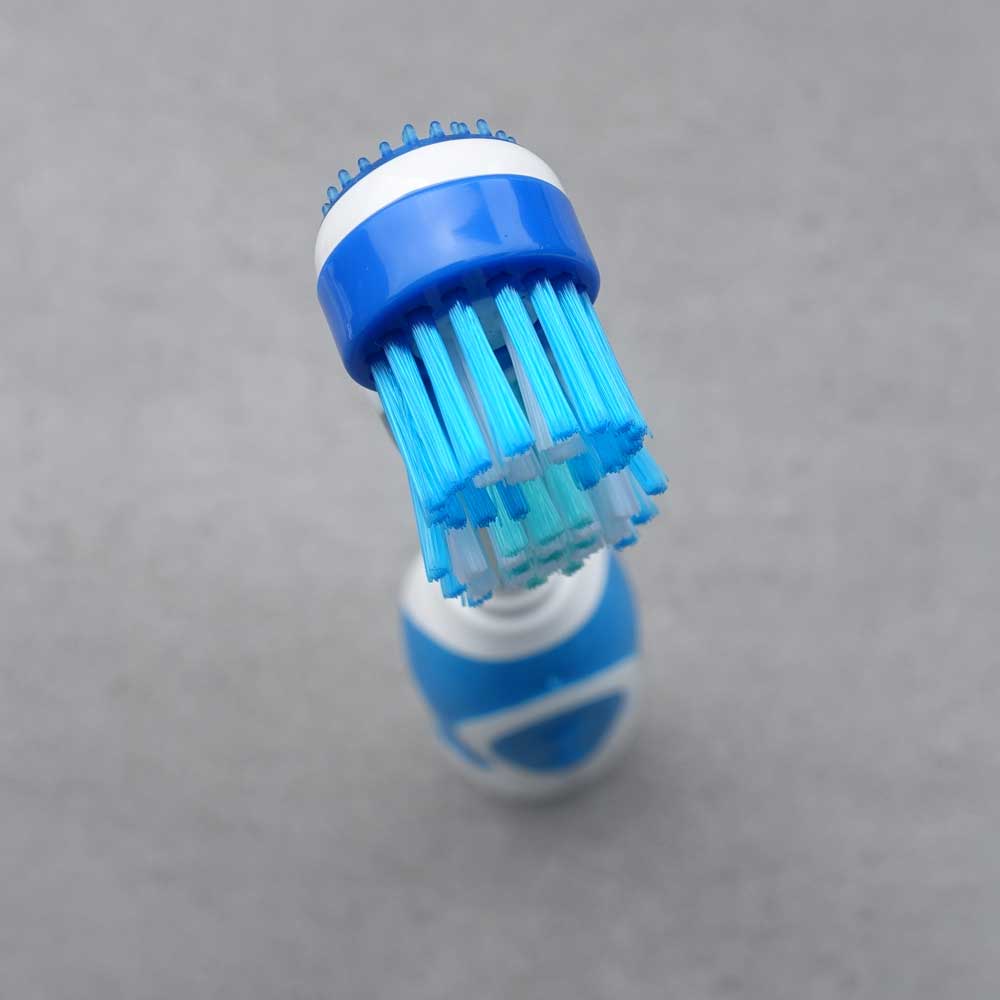 Ariel shot of the Colgate 360 Degrees Whole Mouth Clean battery toothbrush