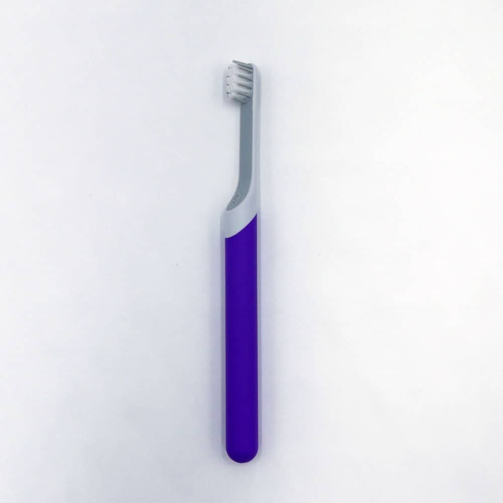 Full length shot of purple quip kids electric toothbrush