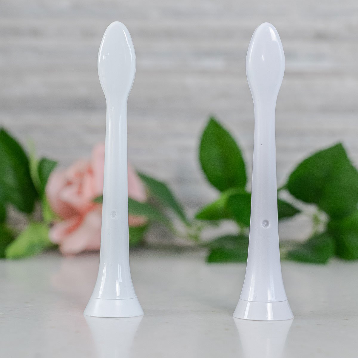 Real vs fake Sonicare brush head from the backside