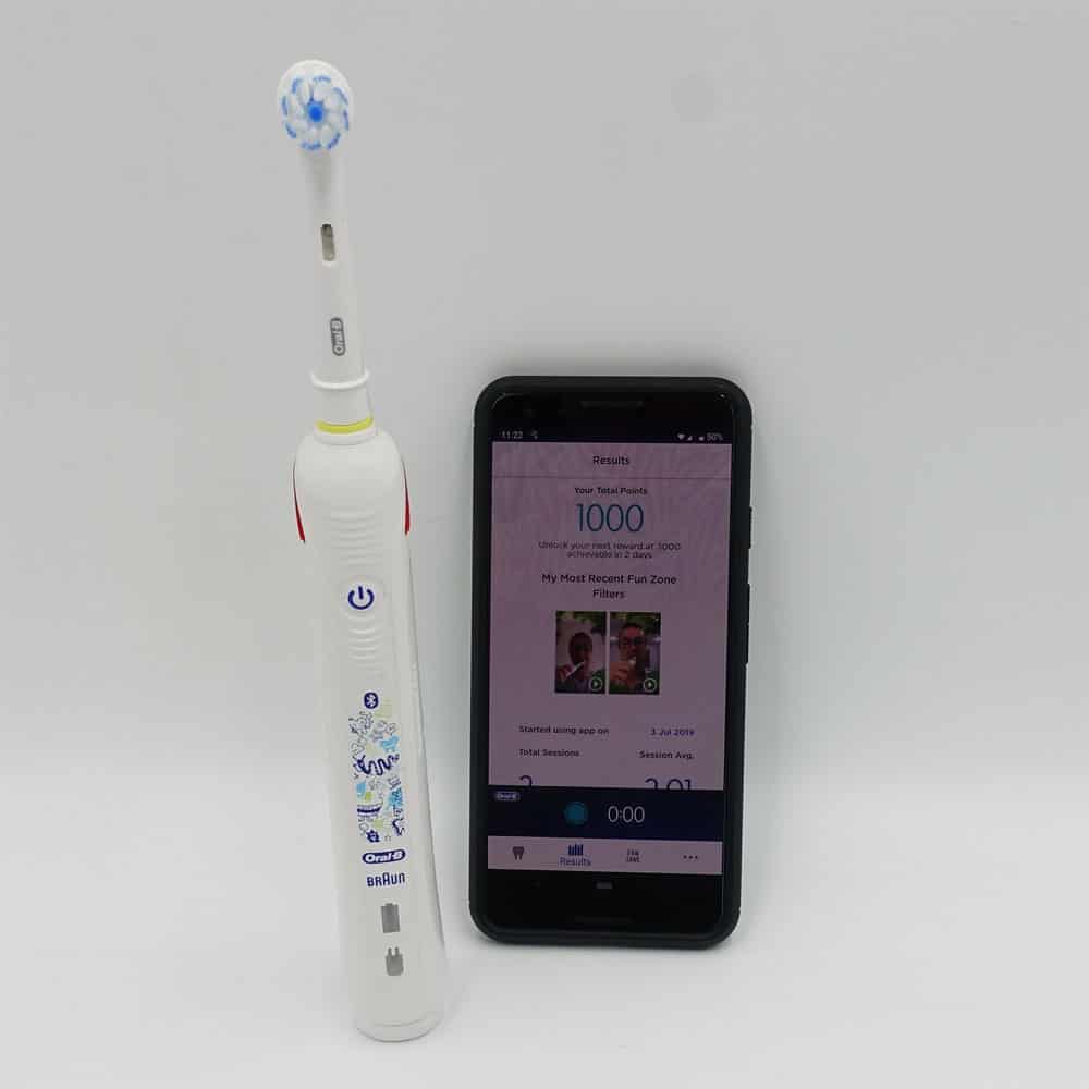 Oral-B Junior Smart Toothbrush next to smartphone