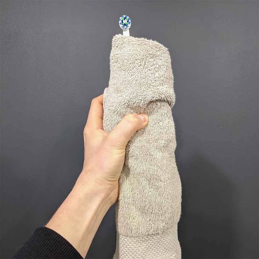 Toothbrush wrapped in a towel