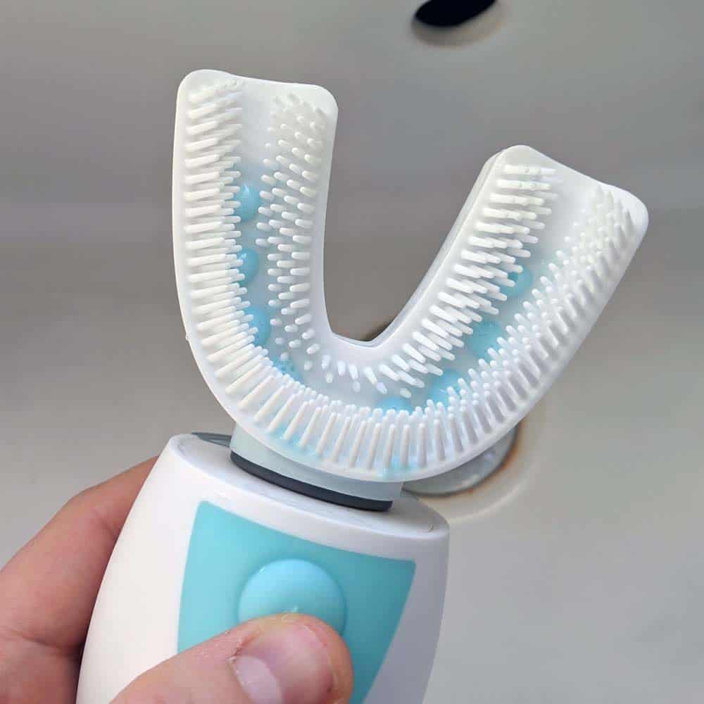 Mouthpiece style toothbrush with silicone bristles