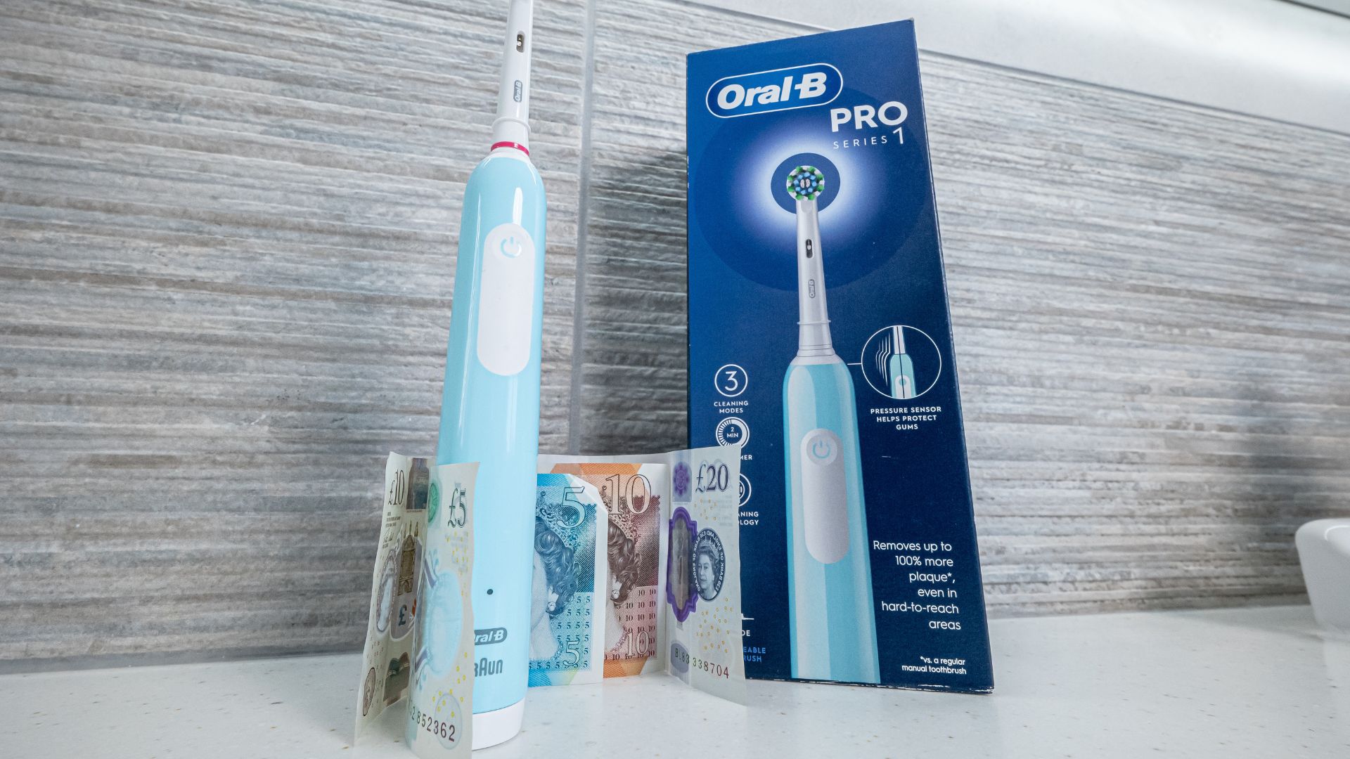 Pro 1 electric toothbrush with its packaging