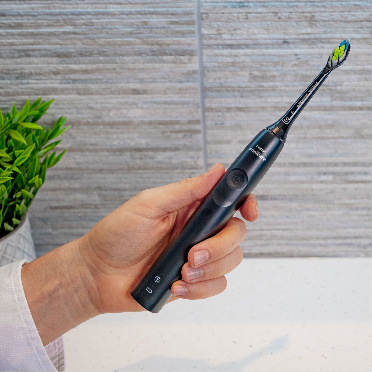 Sonicare 4100 Series held in the hand at a slight angle