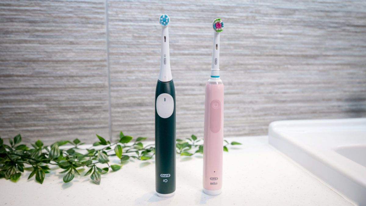 Oral-B iO2 and Pro 3 3000 stood next to each other