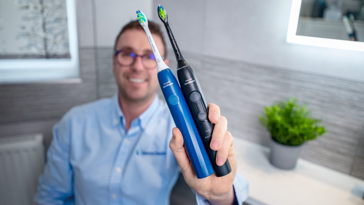 Jon holding Sonicare 2100 Series and 4100 Series
