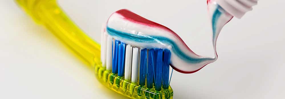 Toothpaste on a manual toothbrush