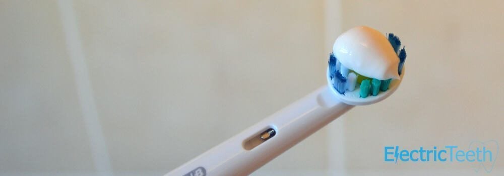 Toothpaste on toothbrush head