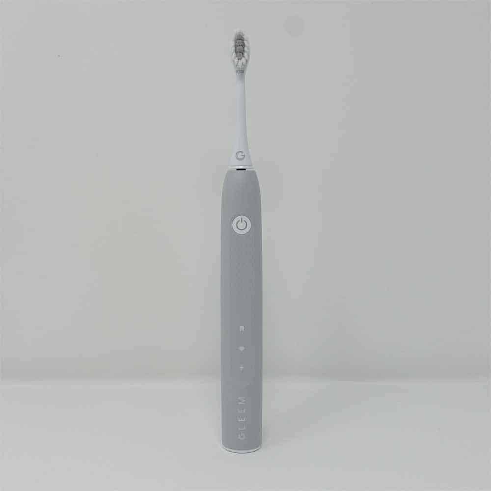 GLEEM rechargeable toothbrush stood upright