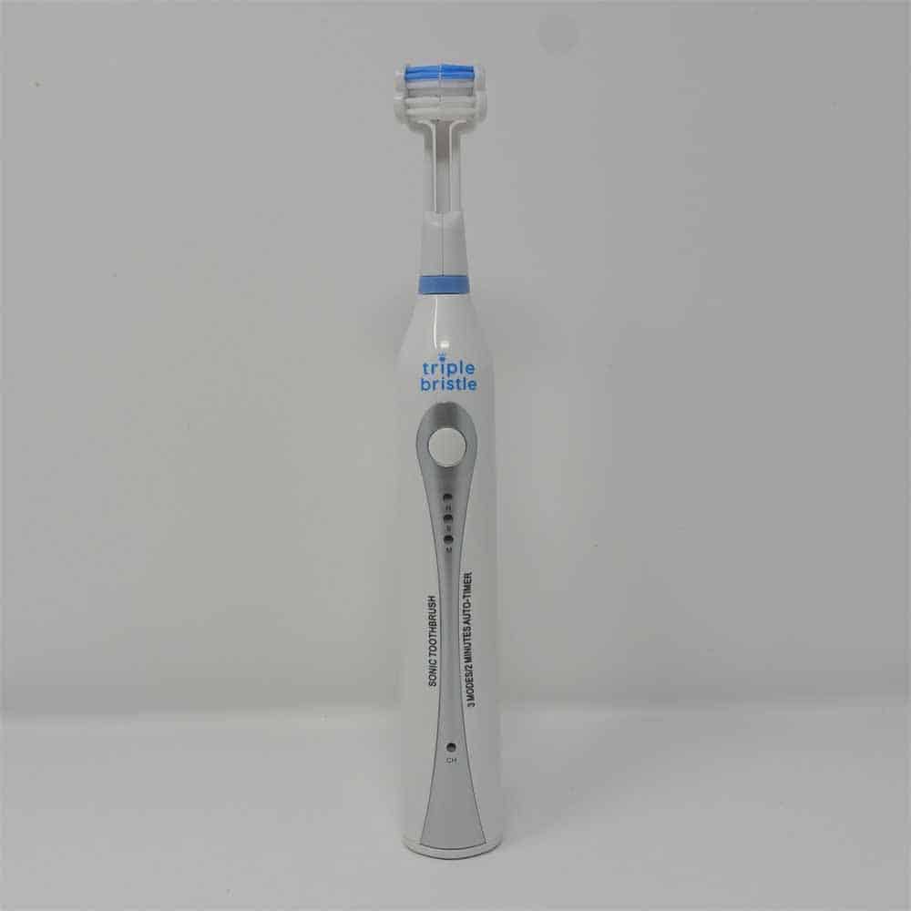 Face on view of Triple Bristle toothbrush