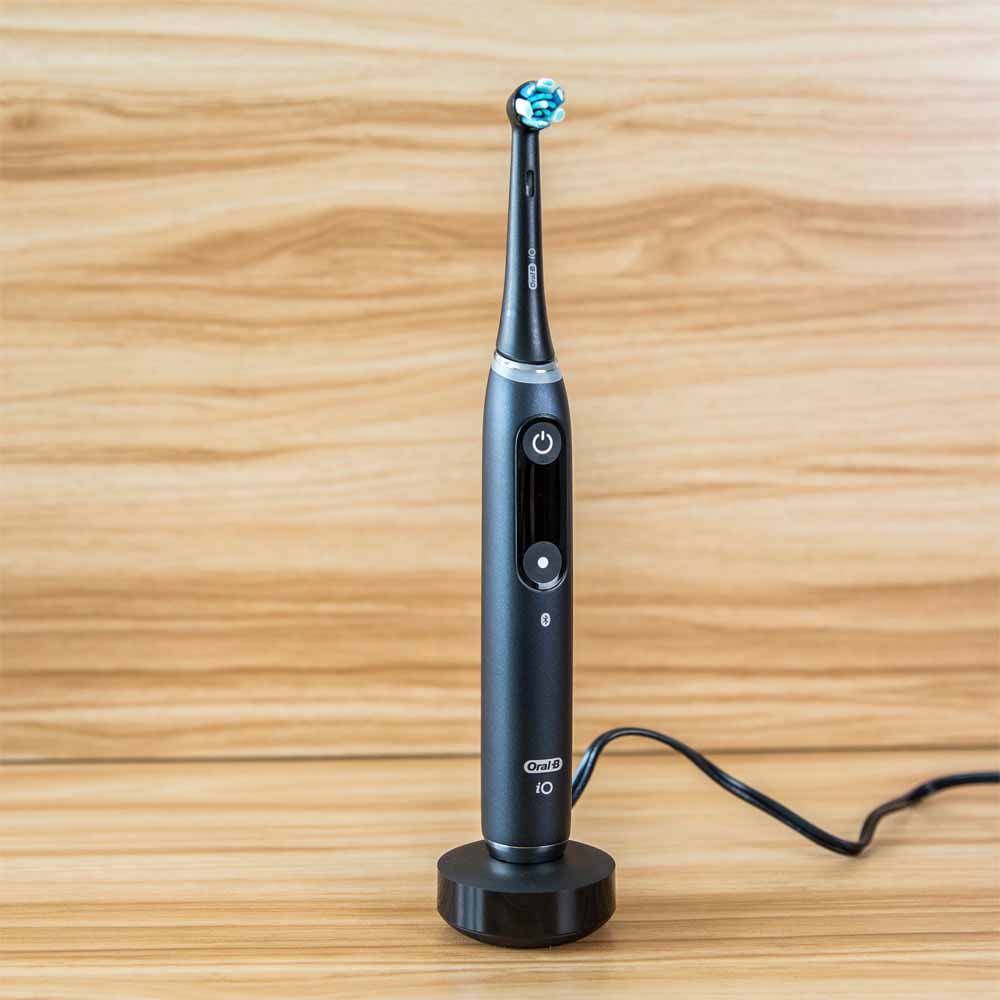 Oral-B iO Series 9 Black on charging stand