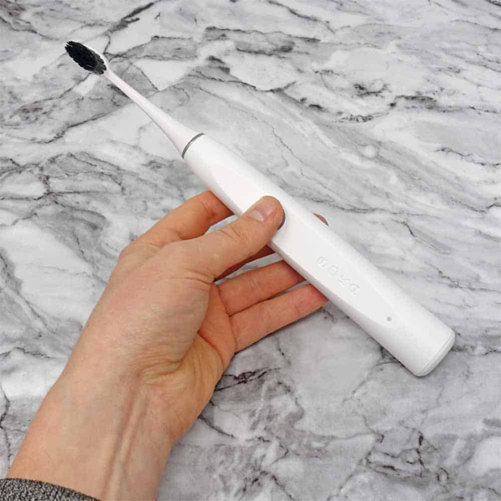 Boka toothbrush held in a hand