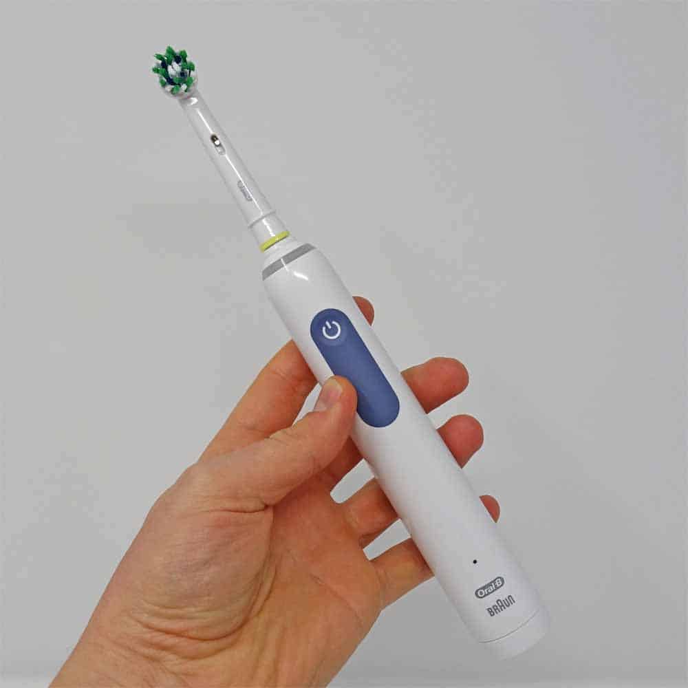 Oral-B Smart 1500 Electric Toothbrush in Hand