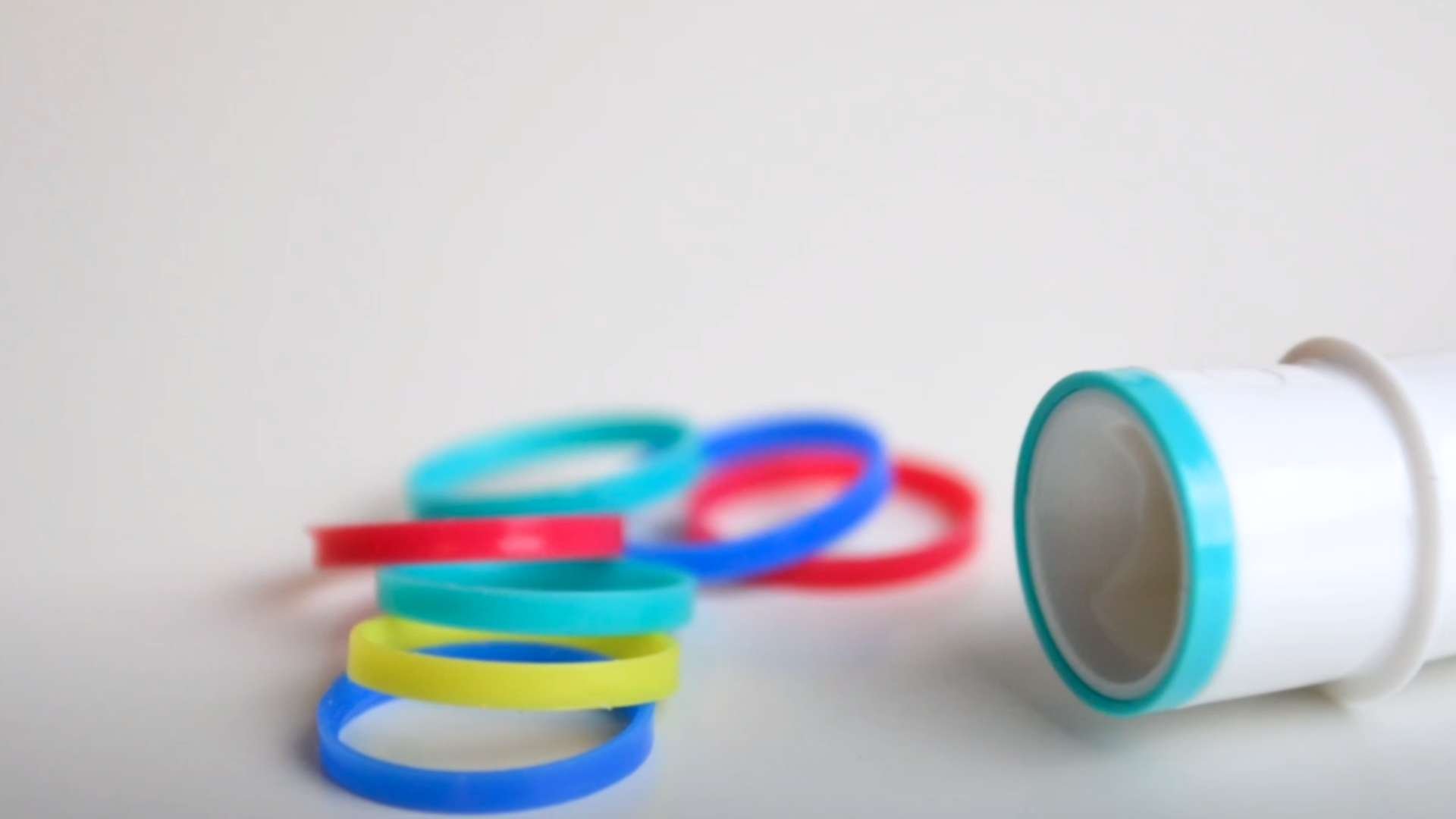 Oral-B Colored rings next to a brush head