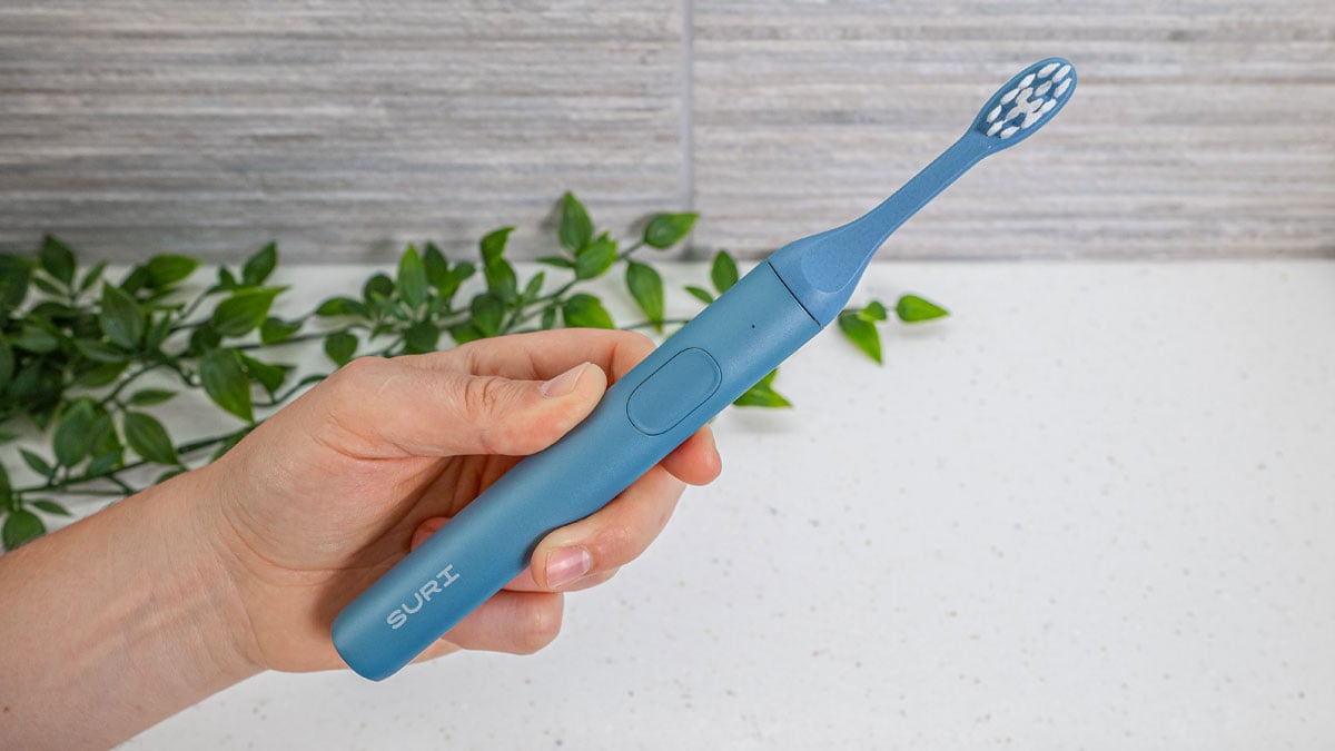 Morning Waves SURI sustainable electric toothbrush in the hand