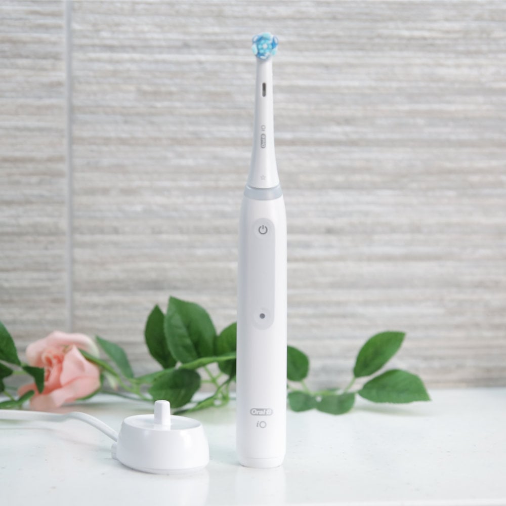 Oral-B iO 3 next to charging stand