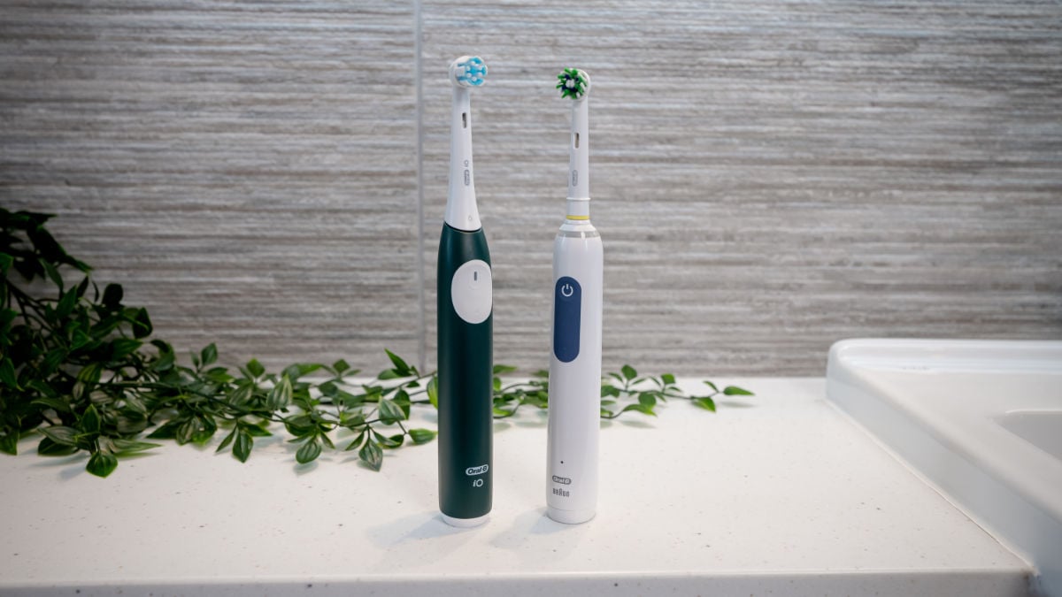Oral-B iO2 vs Oral-B Smart 1500 stood next to each other