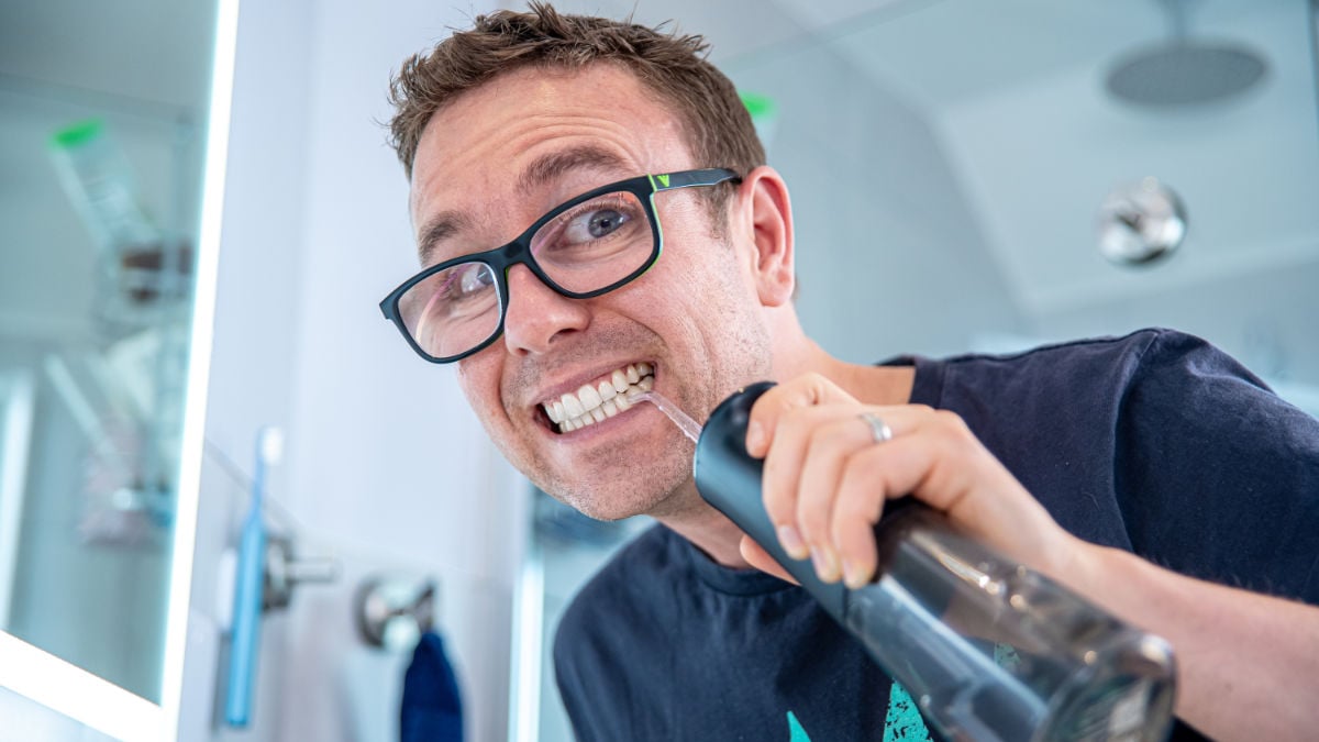Jon testing Bitvae water flosser