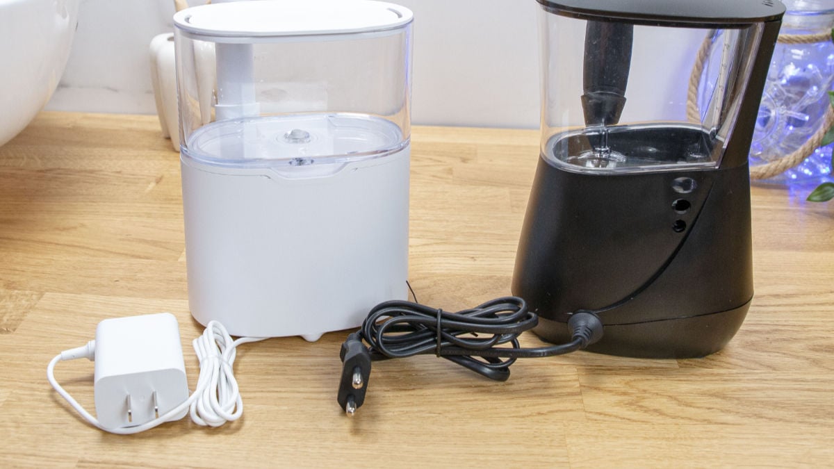 Rear of Waterpik Aquarius and Sonicare Power Flosser showing power cables